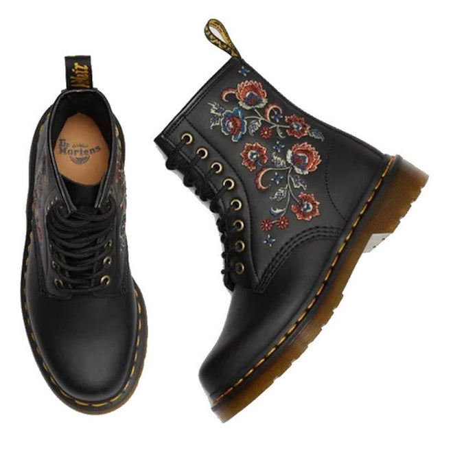 A pair of black Dr Martens 1460 Vonda TF Tavern Floral Genix Nappa Leather boots with yellow stitching and red-blue floral embroidery, shown from top and side views against a white background., 47991, 190665742619, 190665742626, 190665742633, 190665742657, 47996, 47997