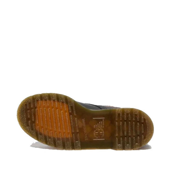 The image displays the sole of a Dr. Martens 1460 Vonda TF Tavern Floral Genix Nappa Leather boot, with translucent brown rubber, a textured grip pattern, and visible branding at the center on a plain white background., 47991, 190665742619, 190665742626, 190665742633, 190665742657, 47996, 47997