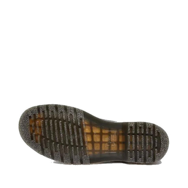 The image shows the underside of a Dr Martens 2976 Ambassador Black Leather Chelsea Boot with a translucent rubber sole featuring a grid pattern and horizontal ridges, displayed on a plain white background., 50056, 50057, 50059, 190665663303, 190665663310, 190665663327, 50067, 50068