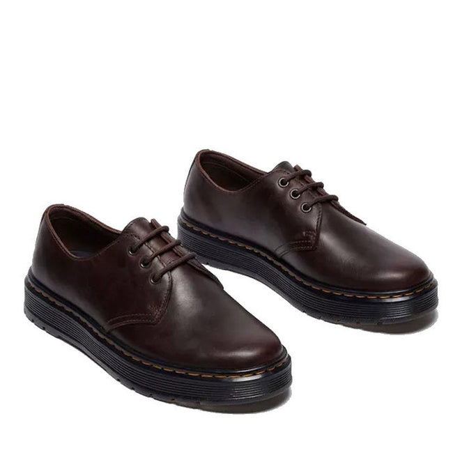 The Dr Martens Brookline Lo Dark Brown Crazy Horse Leather Shoe features a SoftWair insole, thick black rubber soles, and brown stitching detail, shown on a white background., 52062, 52063, 52064, 190665753912, 190665753936, 190665753943, 190665753950, 52069, 52070, 52071