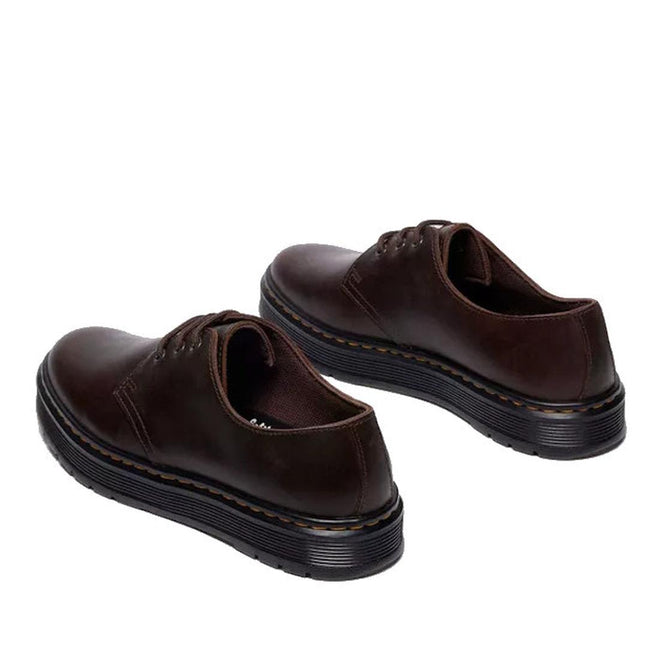 The Dr Martens Brookline Lo Dark Brown Crazy Horse Leather Shoe features black ridged soles, brown stitching, a comfy SoftWair insole, and is shown on a white background., 52062, 52063, 52064, 190665753912, 190665753936, 190665753943, 190665753950, 52069, 52070, 52071