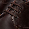 Close-up of the Dr Martens Brookline Lo Dark Brown Crazy Horse Leather Shoe, with matching laces, black metal eyelets, detailed stitching and textured leather, plus a SoftWair insole for enhanced comfort., 52062, 52063, 52064, 190665753912, 190665753936, 190665753943, 190665753950, 52069, 52070, 52071