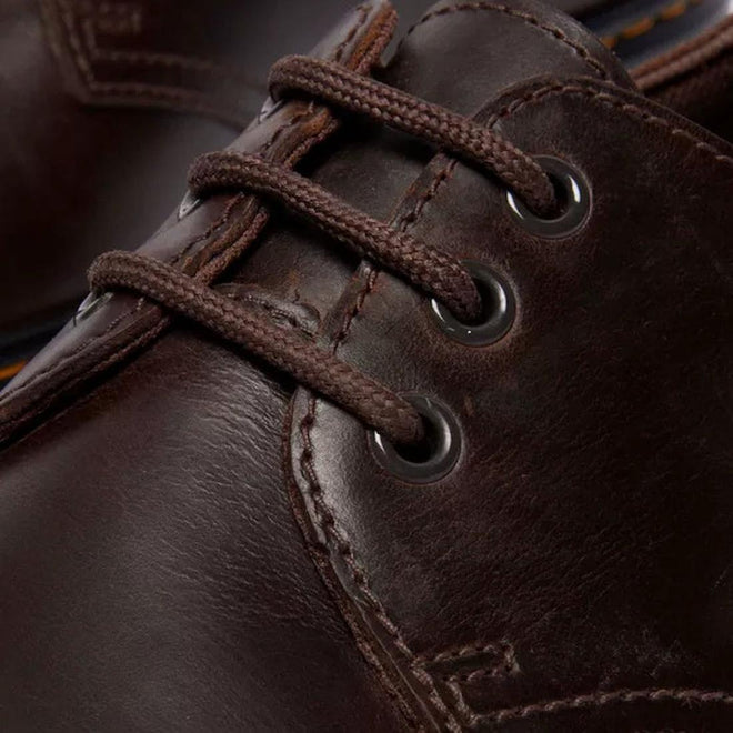 Close-up of the Dr Martens Brookline Lo Dark Brown Crazy Horse Leather Shoe, with matching laces, black metal eyelets, detailed stitching and textured leather, plus a SoftWair insole for enhanced comfort., 52062, 52063, 52064, 190665753912, 190665753936, 190665753943, 190665753950, 52069, 52070, 52071