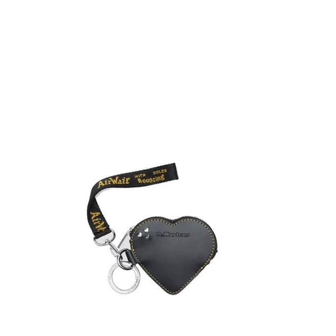 front view of a Dr Martens Heart-shaped key pouch, coinpurse, bag charm with Airwair strap on a white background,
190665739794,