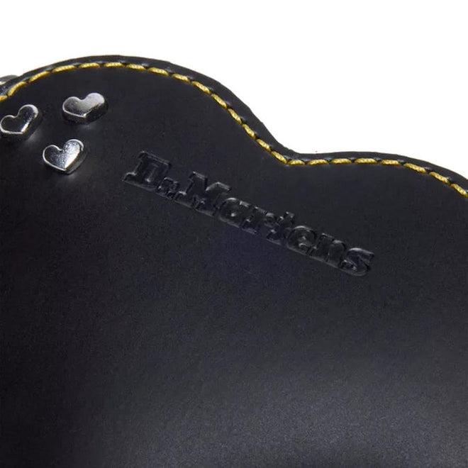 Close-up of a black leatherDr Martens bag charm coin pouch product with 'Dr. Martens' branding and decorative elements.
190665739794,