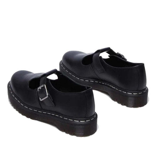 Dr Mrtens Pollet T Bar heel shot of both feet looking forward Black shoes with buckles and white stitching on a white background.,
190665696905,
190665696912,
190665696936,