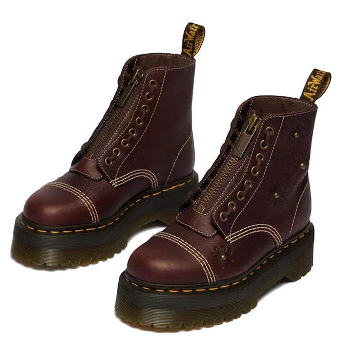 The Dr Martens Sinclair Flower Dark Brown Grizzly Leather Boot features a platform Quad sole, yellow stitching, front zippers, decorative flower details, and back pull tabs., 51903, 51904, 190665777116, 190665777123, 190665777147, 51909, 51910