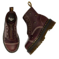 A pair of Dr Martens Sinclair Flower Dark Brown Grizzly Leather Boots featuring floral embossing, yellow stitching, thick Quad platform soles, side zippers, and branded heel loops. One boot is shown from above, the other from the side., 51903, 51904, 190665777116, 190665777123, 190665777147, 51909, 51910