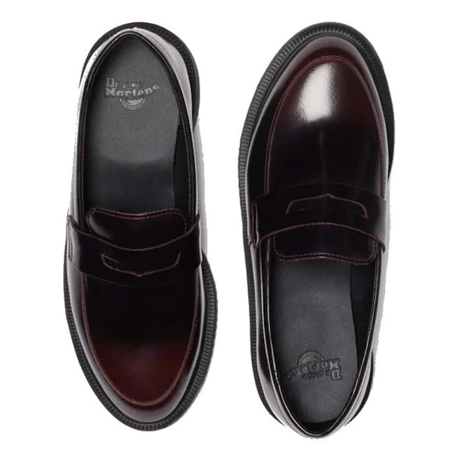 The Dr. Martens Temara Cherry Red Arcadia Leather Loafer features a classic penny design, glossy finish, Goodyear-welted build, and thick black soles for signature durability and style, shown here from above., 190665747560, 190665747577, 190665747591, 52060, 52061