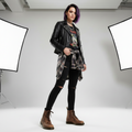 A woman with purple hair stands confidently in a photo studio, wearing black jeans, a leather jacket, and the Dr Martens 1460 Cherry Red Crazy Horse Waxy Leather 8 Eye Boot. Two large softbox lights are visible in the background., 190665786835, 190665786842, 190665786859, 190665786873, 190665786880, 190665786897, 190665786910, 50000, 50001, 50002
