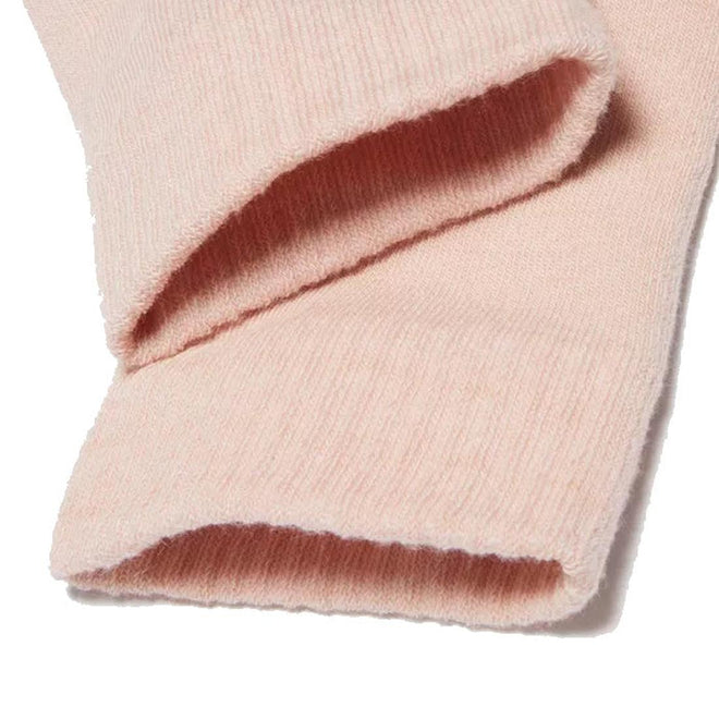 Close-up of the cuffs of Dr Martens Socks Double Doc Sock Powder Pink Unisex, a light pink ribbed knit sock—comfortable like padded or blister protection socks—overlapping each other on a white background., 190665728293, 190665728286