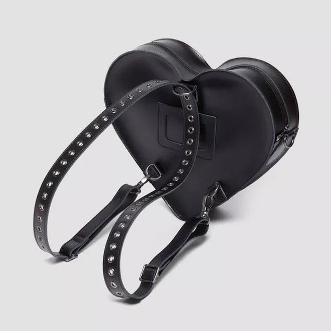 A view of the back of the dr martens heart back showing the  straps so that it can be worn as a backpack.  190665728408

