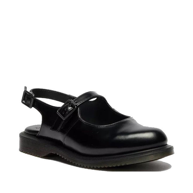 The Dr. Martens Madaline Black Smooth Women's Slingback Mary Jane features polished black leather, a closed toe, low heel, T-strap design, and an adjustable ankle buckle—classic style shown on a white background.