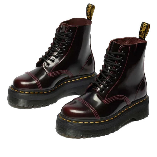 The Dr. Martens Sinclair Cherry Red Arcadia Leather Platform Boot features high-shine leather, yellow stitching, black laces, a thick black sole, and a yellow-branded pull tab at the back., 51252, 190665278637, 190665278644, 190665278668, 51256