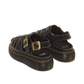 Dr Martens Wrenlie Flower Open Toe Black Milled Nappa Quad Sandal featuring black open-toe fisherman straps with white stitching, buckle closures, and a thick lug sole with Goodyear welted construction.
