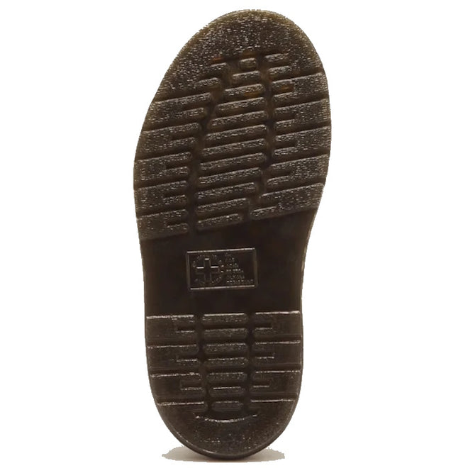 The bottom of a dark brown, lugged rubber sole on a Dr Martens Wrenlie Flower Open Toe Black Milled Nappa Quad Sandal, featuring a textured tread pattern and a central embossed logo.