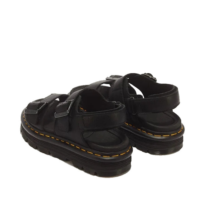 Dr Martens Zebzag Black Pisa Leather 3 Strap Sandal featuring black three-strap styling, thick lug soles, and yellow stitching along the air-cushioned welt.