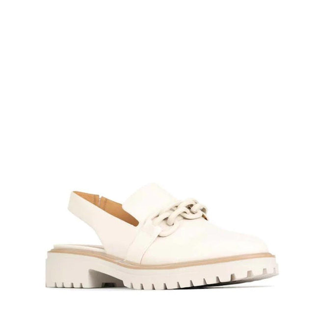 White shoe with  slingback and a chunky sole on a white background
