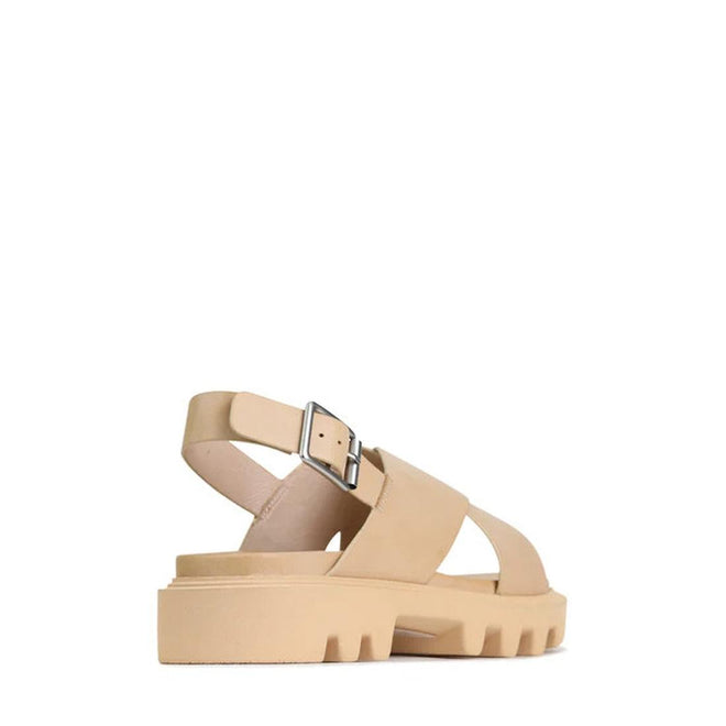 The EOS Womens Flighty Nude Chunky Look Leather Sandal, featuring thick straps, a silver ankle buckle, and a chunky textured sole, is shown from the back side against a white background., 49657, 49658, 49659, 49660, 49661, 49662, 49663