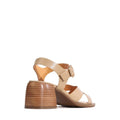 The EOS Isoken Desert Women's Leather Heeled Sandal features tan cashmere leather, two foot straps, and a gold-buckled ankle strap, shown against a plain white background., 9321191307015, 9321191307022, 9321191307039, 9321191307046, 9321191307053