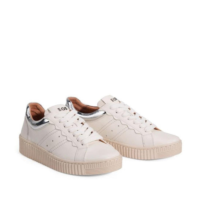 The EOS Jolie Bone Beige Womens Leather Trainer With Zip features white leather, beige soles, side perforations, metallic silver heel detail, and visible branding on the tongue—combining comfort, style, and versatility in one chic sneaker., 47242, 9321191308203, 9321191308210, 9321191308227, 9321191308234, 9321191308241, 47248