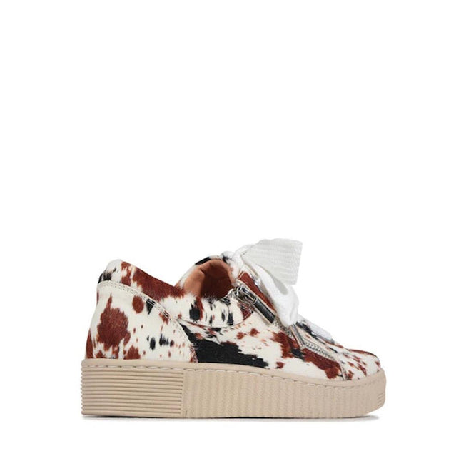 Side and heel view of the EOS Jovi Texas Pony Leather Lace Up With Zip—a low-top sneaker with cowhide pattern in brown, black, and white, thick beige sole, side zip, and white laces., 51482, 9321190036015, 9321190036022, 9321190036039, 9321190036046, 9321190036053, 51488