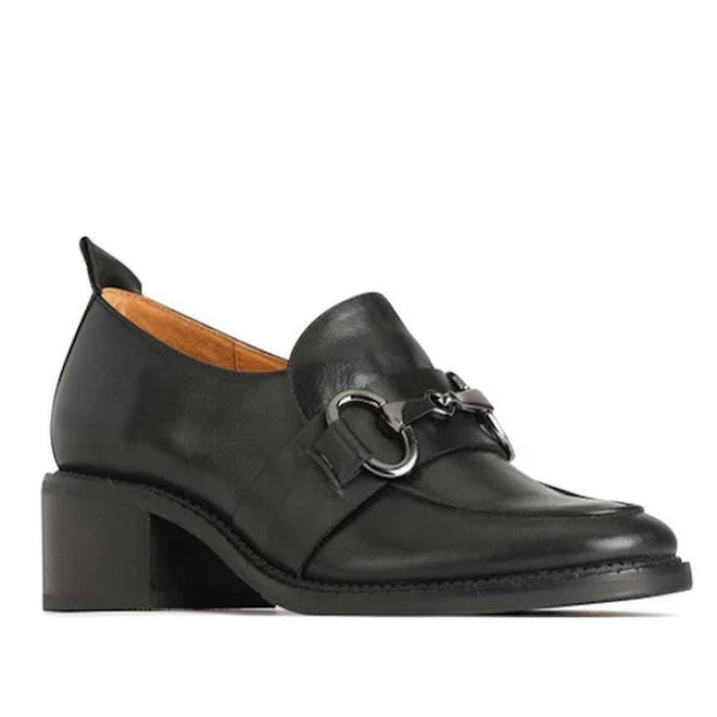 Black leather loafer shoe with heel with a circular linked accessory over the top of the foot on a white background