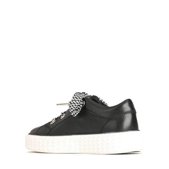 The EOS Trinsic Black Leather Lace Up Trainer features cashmere leather, a thick white chevron-patterned outsole, and black-and-white laces. Shown in profile on a plain white background. Part of the TRINSIC collection., 36520, 9321191200897, 9321191200903, 9321191200910, 9321191200927, 9321191200934, 36526