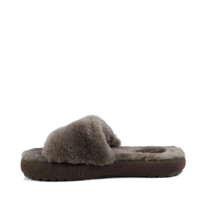 The EMU Women's Mckay Dark Olive Sheepskin Scuff Slipper Slide features a plush band and sole and is shown in profile view against a white background—ideal for women who love cozy slippers., 50733, 9330071976265, 9330071976272, 9330071976289, 50737, 50738