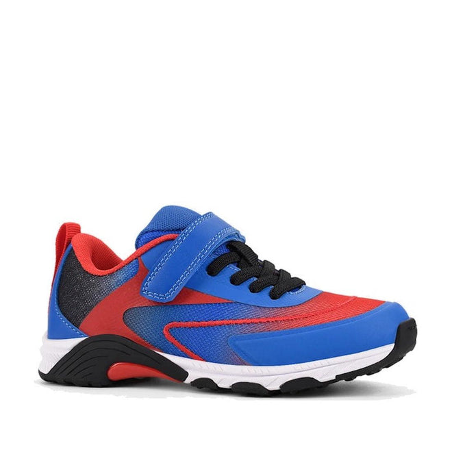 The Harrison Nifty Kids Sports Trainer Blue/Red is a children's athletic shoe with blue, red, and black accents, a blue Velcro strap, black laces, and a white sole. Made from breathable leather, it’s perfect for comfortable school sports.