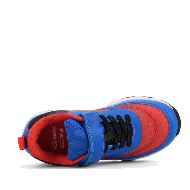 Top view of the Harrison Nifty Kids Sports Trainer Blue/Red with black laces, breathable leather, blue Velcro strap, white sole, red lining, heel pull tab, and a removable innersole for comfort., 50118, 9361913035901, 9361913035925, 9361913035949, 9361913035963, 9361913035987, 9361913036007, 9361913036021, 50126, 50127, 50128