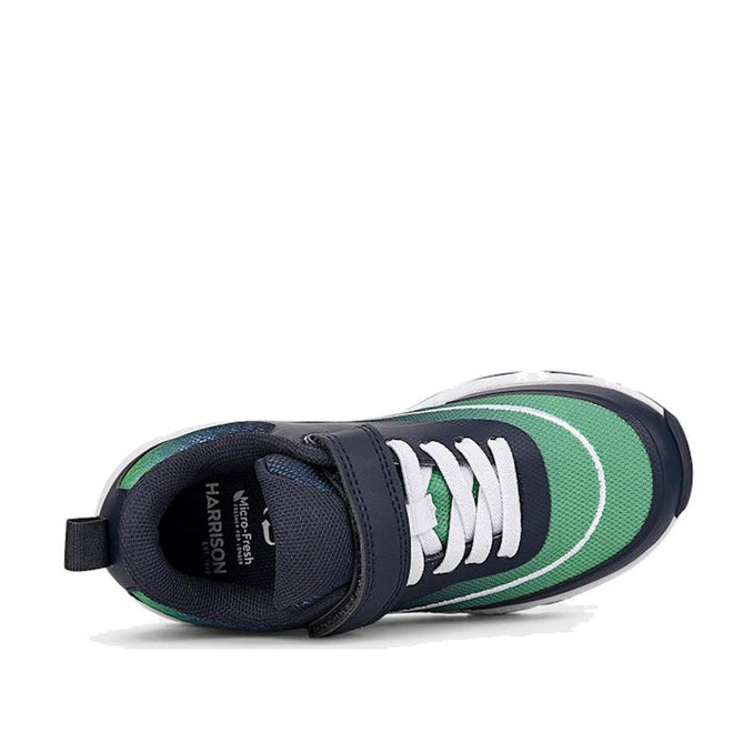 The Harrison Nifty Kids Sports Trainer in navy, green, and white features mesh and breathable leather uppers, a durable rubber sole, white laces with a velcro strap for adjustable fit, and is shown from above., 49664, 9361913035710, 9361913035734, 9361913035758, 9361913035772, 9361913035796, 9361913035819, 9361913035833, 49672, 49673, 49674