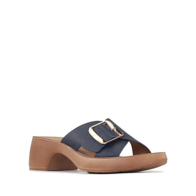 The Los Cabos Alegro Navy Wedge Platform Women's Sandals Slides feature a wide adjustable navy strap with a large gold buckle, low wedge heel, and brown sole, showcased on a plain white background.