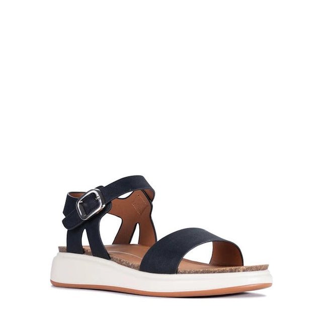 The Los Cabos Cartis Black Women's Summer Sandal features an open toe, ankle strap with buckle, thick white sole with brown trim, and a moulded footbed for comfort, all shown on a plain white background.