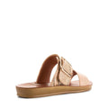 The Los Cabos Doti Taupe Multi Light Flexible Sandal is a women's tan slip-on with a cushioned sole, woven strap, decorative buckle, and open toe, shown from the back left on a plain white background. Perfect for everyday summer comfort., 9321191300368, 9321191300375, 9321191300382, 9321191300399, 9321191300405, 9321191300412