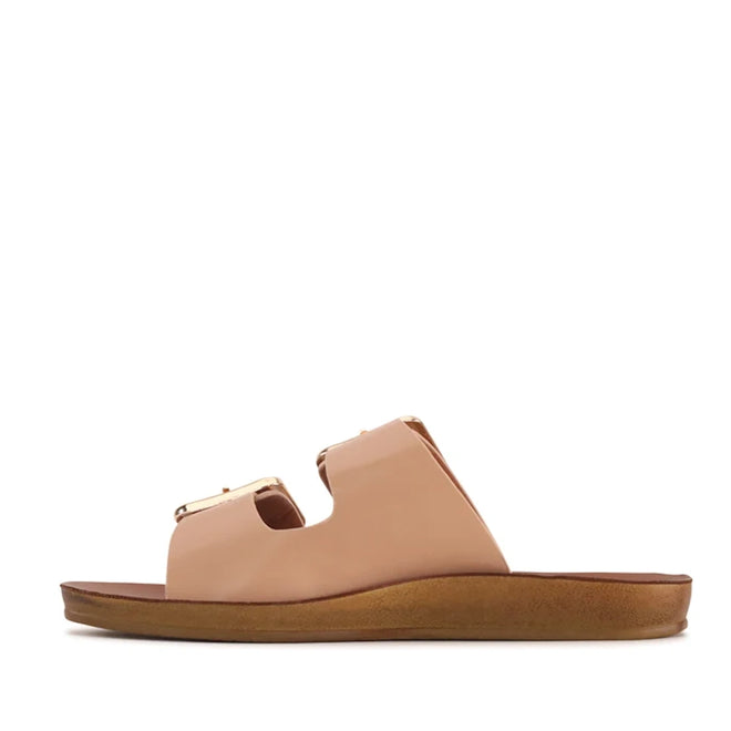 The Los Cabos Womens Dina Pecan Beige Light Flexible Two Strap Slide Sandal features two wide beige straps with gold accents and a brown cushioned sole with an anatomical footbed for enhanced comfort and arch support, shown in profile view on a white background.