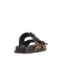 A side-rear view of the Los Cabos Zani Women’s Slide Double Strap Sandal in Black Leopard, showcasing its ergonomic black sole and two leopard print straps with black buckles. The sandal is angled to display both the side and back, highlighting its comfortable design and bold Leopard Print slide style., 9321190078664, 9321190078671, 9321190078688, 9321190078695, 9321190078701, 9321190078718, 53733
