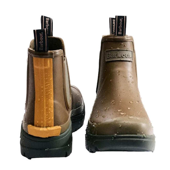 Two Barbour Nimbus Olive/Ochre Chelsea Wellingtons Mens Rainboots are shown wet from back and front angles. These waterproof ankle boots feature black branded pull tabs and yellow ochre accents on the heel., 5063669168813, 5063669168820, 5063669168769, 5063669168776