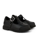 A pair of Pretty Brave Athena Trainer Black Leather T-Bar School Shoes with silver buckle and thick rubber soles, made from genuine leather, displayed on a white background.