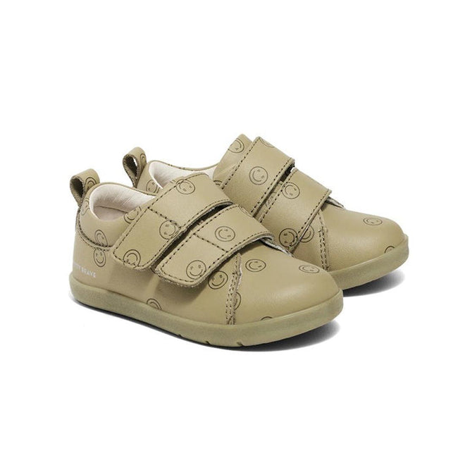 Pair of sage green Pretty Brave Brooklyn children's First walking  shoes with a smiley face print with velcro straps on a white background