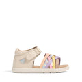 The Pretty Brave 1st Walker Eden Rainbow Leather Open Toe Sandal is a beige girls' sandal with a closed heel, adjustable strap, heart detail, and pastel yellow, pink, and lavender crisscross straps—podiatrist-approved on white background., 9420075355705, 9420075355699, 9420075355682, 9420075355675