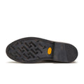 The image shows the black Vibram outsole of the Rollie Womens Chelsea Rise Vintage Mocha Leather Boot, featuring a patterned tread, yellow Vibram logo, and horizontal grooves at the heel., 9339554341682, 9339554341699, 9339554341705, 9339554341712, 9339554341729