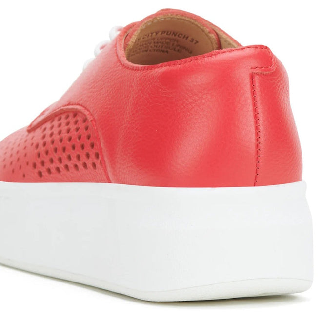 Close-up of the Rollie Womens Derby City Punch Red Leather Trainer, featuring premium red leather, white laces, perforated detailing for breathability, and a chunky white platform sole for a stylish and modern look., 9781760775599, 9781760775605, 9781760775612, 9781760775629, 9781760775636