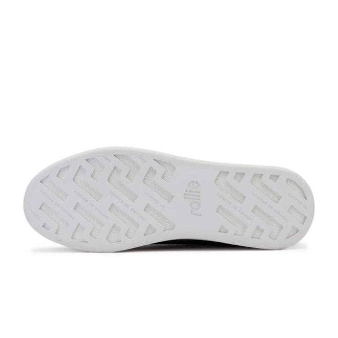 The image displays the white sole of the Rollie Womens Derby City Punch Black Leather Trainer, featuring zigzag tread patterns and "rollie" embossed at the center, photographed against a plain white background., 9339554259628, 9339554259635, 9339554259642, 9339554259659, 9339554259666, 9339554259673