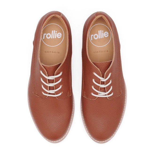 Top down pair of Rollie Derby Cognac brown leather shoes with white laces on a white background, featuring the 'rollie' brand.
9781760789831,
9781760789848,
9781760789855,
9781760789862,
9781760789879,
9781760789886,, 9781760789831, 9781760789848, 9781760789855, 9781760789862, 9781760789879, 9781760789886