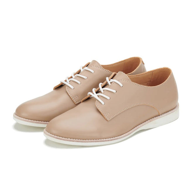 The Rollie Womens Derby Super Soft Latte Leather Shoe features premium beige leather, white laces and soles, and sneaker-like comfort, shown on a white background., 9781760763848, 9781760763855, 9781760763862, 9781760763879, 9781760763886