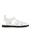 Rollie Womens Fisherman Sandal White Black Leather fisherman-style sandal in white premium leather, featuring a buckled ankle strap, a cushy padded footbed, and a black flat sole., 9339554003092, 9339554003108, 9339554003115, 9339554003122, 9339554003139, 54669