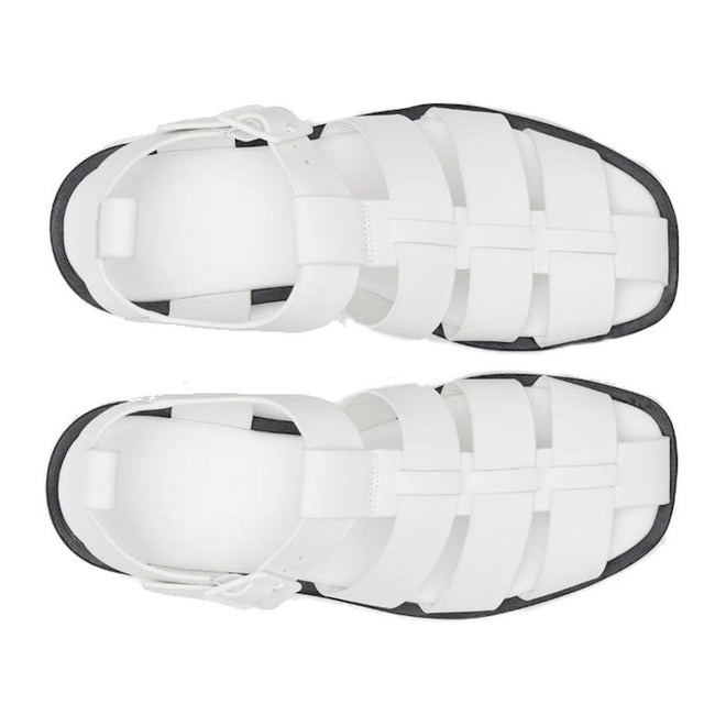 Top-down view of Rollie Womens Fisherman Sandal White Black Leather, featuring premium white leather straps, a black sole, and a cushy padded footbed., 9339554003092, 9339554003108, 9339554003115, 9339554003122, 9339554003139, 54669