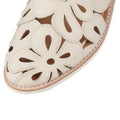 Close-up of a Rollie Derby Sidecut Applique Bone Womens Leather Shoe, an off-white Derby featuring large, floral-shaped cutouts., 54662, 9339554216393, 9339554216409, 9339554216416, 9339554216454, 9339554216461, 54663