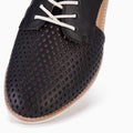 Close-up of the Rollie Womens Sidecut Punch Black Leather Shoe featuring a perforated diamond toe pattern and white laces, highlighting its breathable design against a white background., 9339554249179, 9339554249186, 9339554249193, 9339554249209, 9339554249216, 9339554249223, 9339554249230